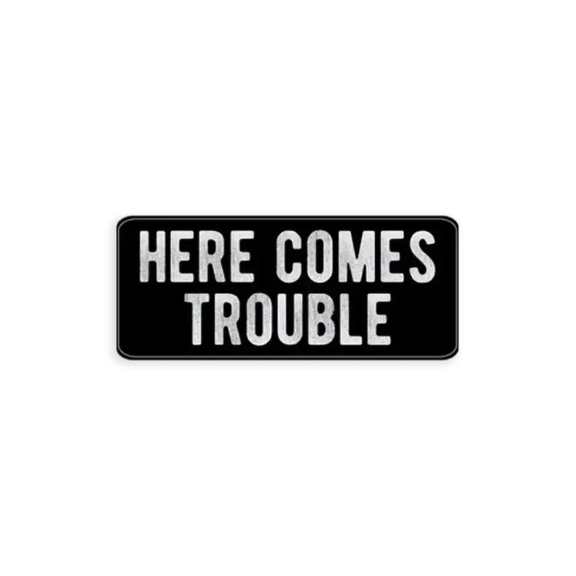 Here Comes Trouble Sticker