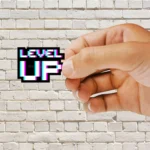 Pixelated Level Up Sticker